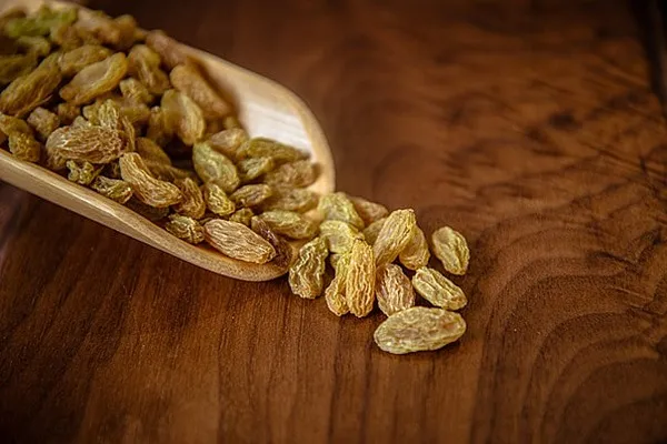 pngtree raisins scattered on the table image 1015016 11zon 11zon